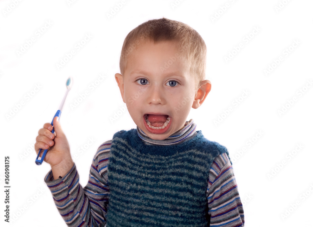 Boy brushing his teeth after bath Boy brushing his teeth after bath