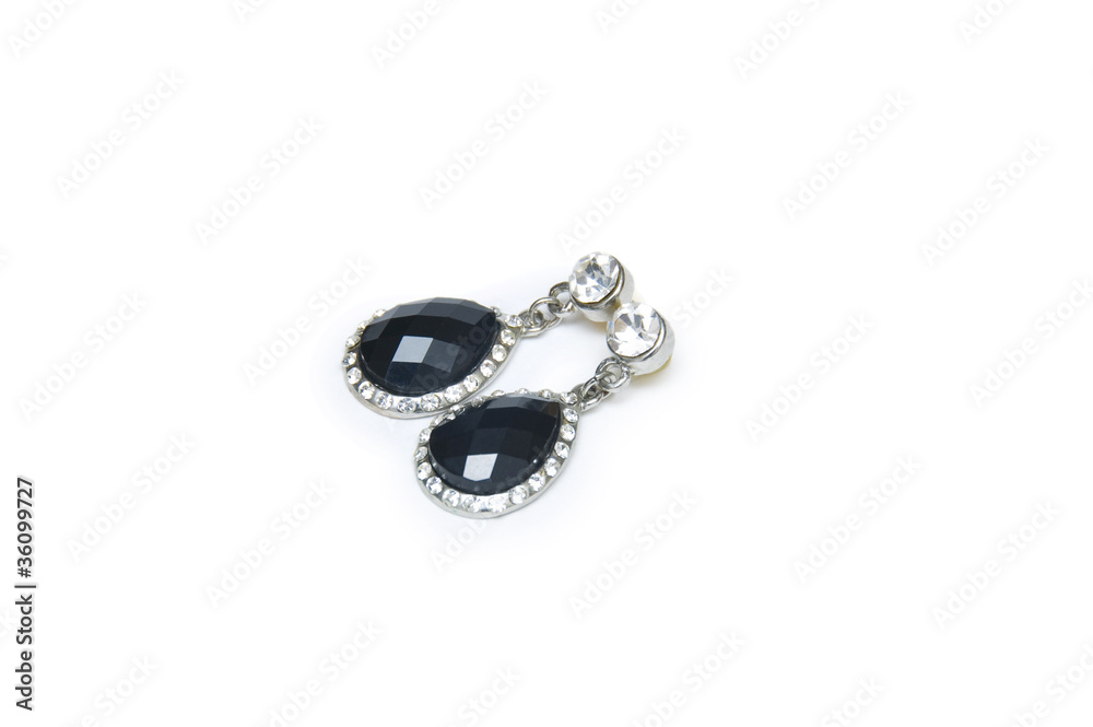 Silver earrings isolated on the white background Silver earrings isolated on the white background