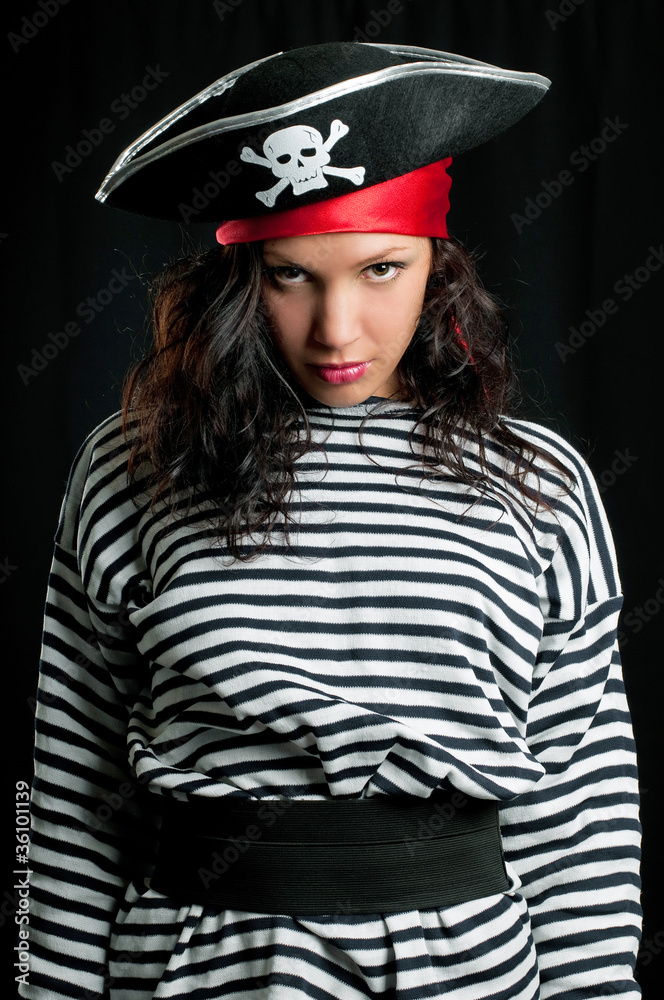 Young woman dressed as a pirate in a black hat Young woman dressed as a pirate in a black hat