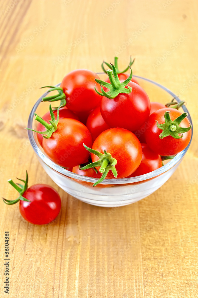 Tomatoes in a glass cup Tomatoes in a glass cup