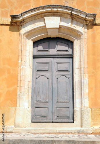 St Michael's church in Roussillon, Provence region in France © Fotokon