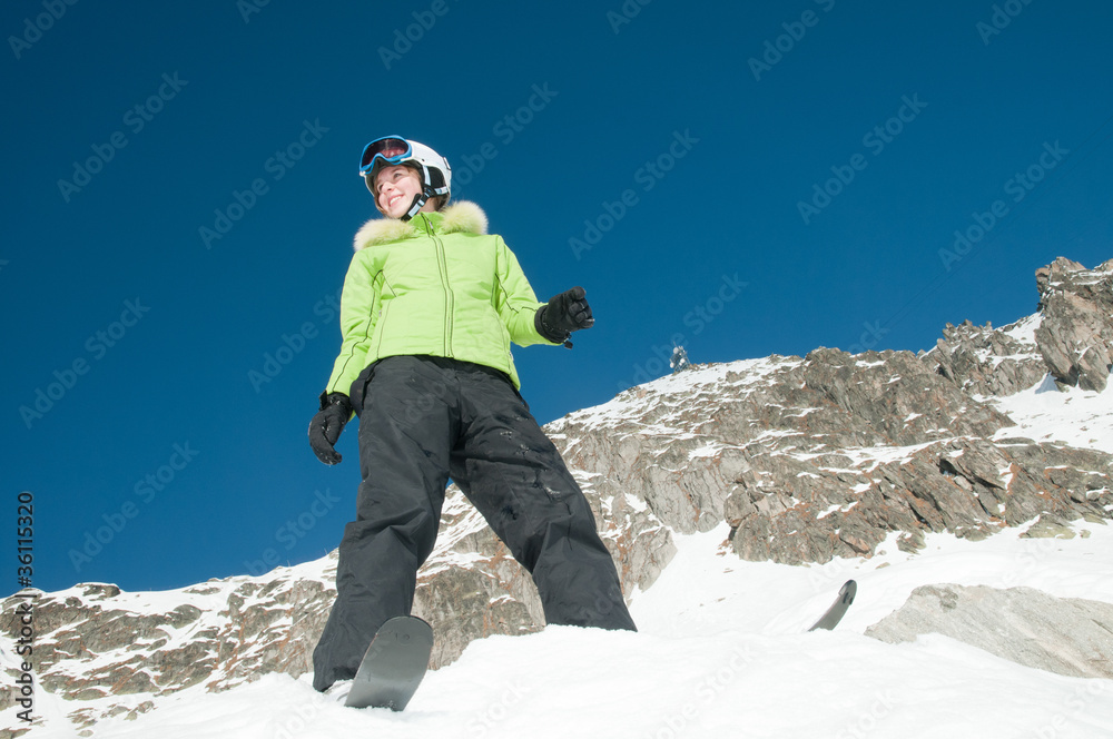 Young skier on ski slope