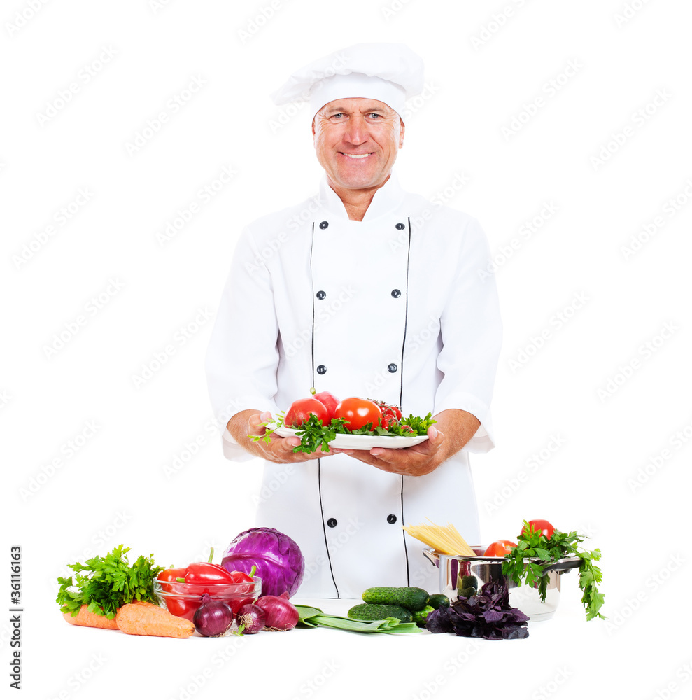 happy chef holding plate with fresh vegetables happy chef holding plate with fresh vegetables
