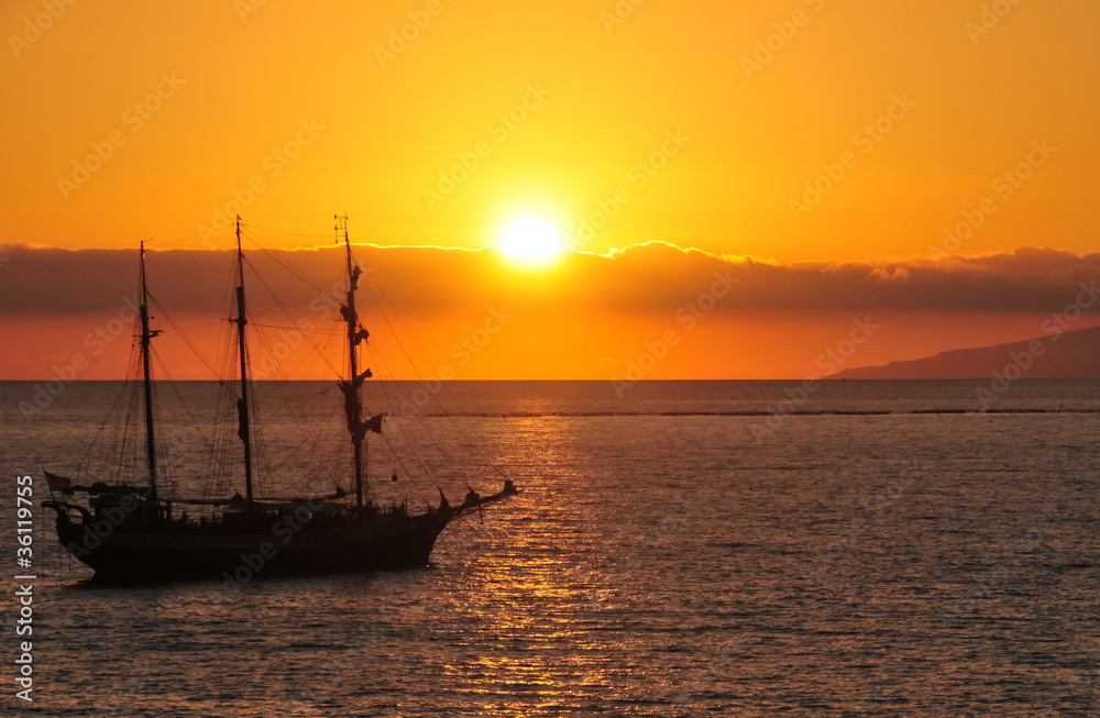 Fototapeta premium Sunset and the piracy ship