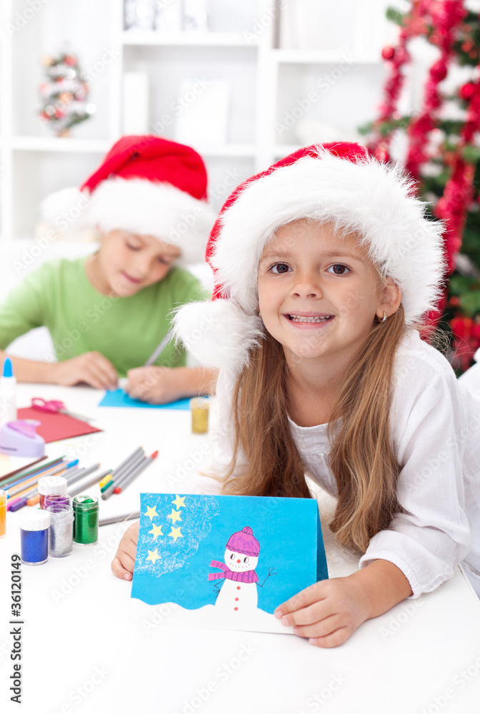 Kids making christmas greeting cards Kids making christmas greeting cards