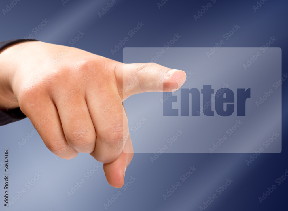 Hand pressing enter button on virtual screen Hand pressing enter button on virtual screen