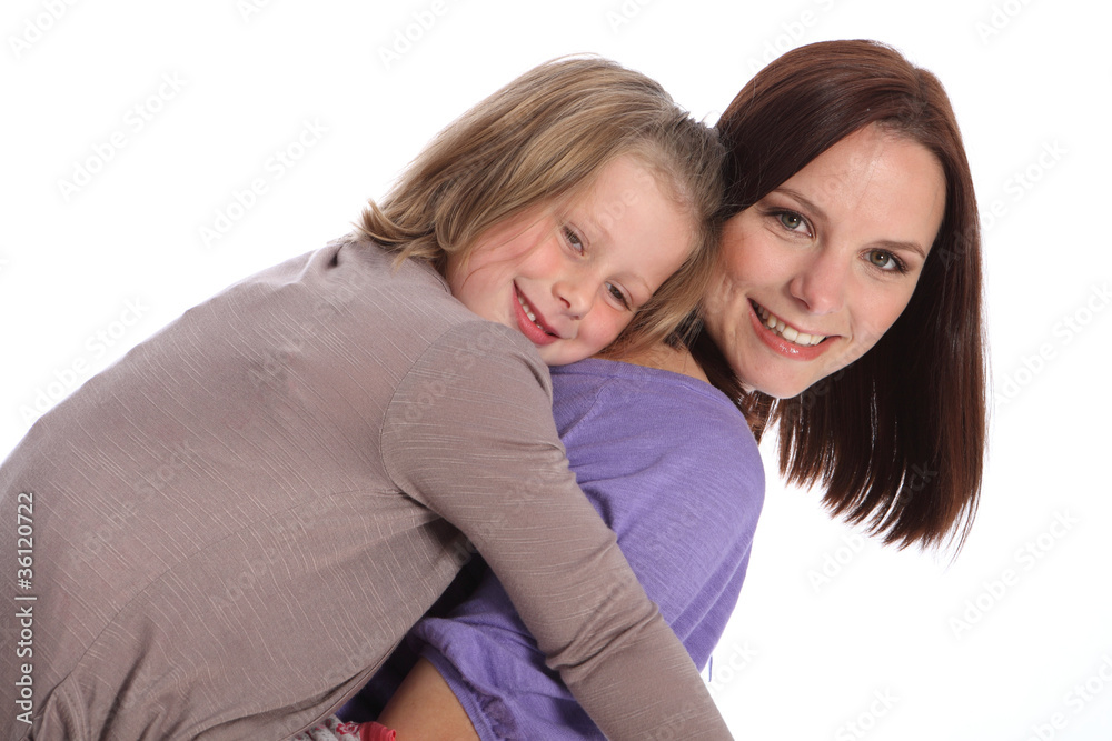 Big smiles mother and daughter piggy back fun Big smiles mother and daughter piggy back fun