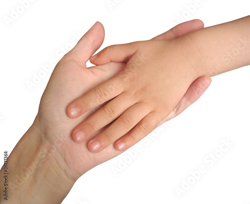 Child's hand on mother's hand isolated on white