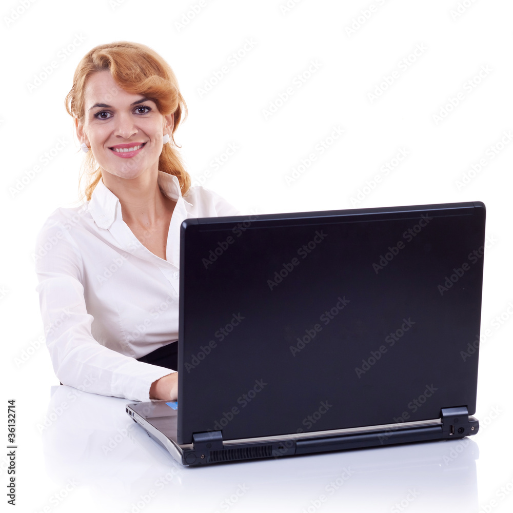 business woman sitting at her desk business woman sitting at her desk