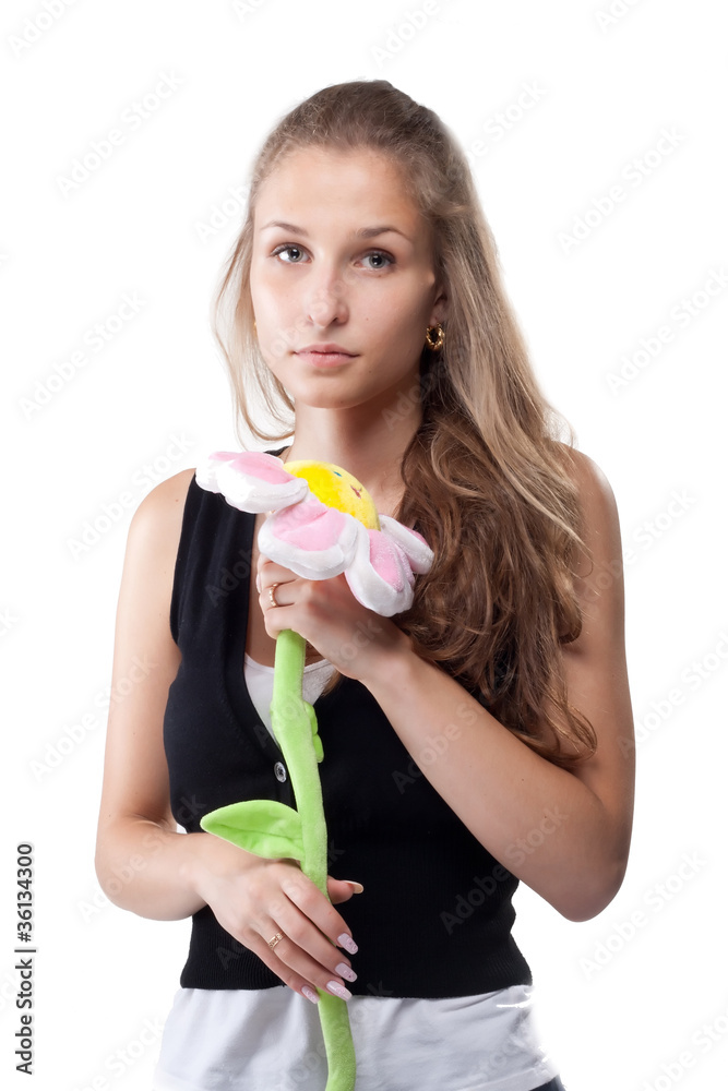 Portrait of a beautiful girl with long hair plush flower Portrait of a beautiful girl with long hair plush flower