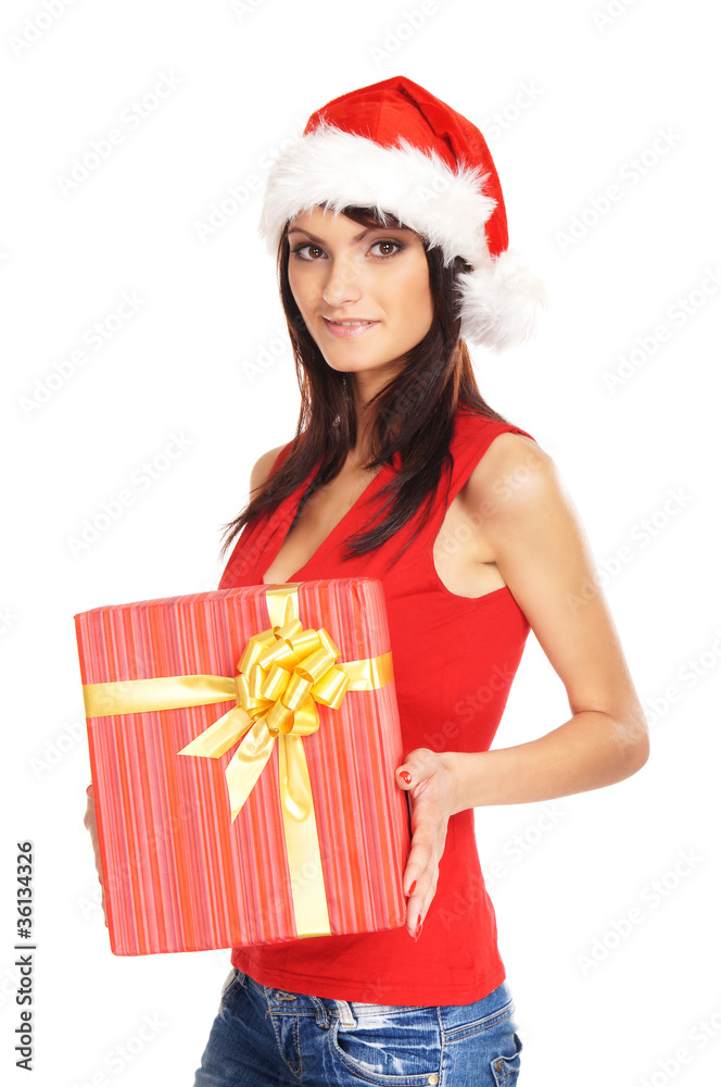Portrait of a woman in a Christmas hat holding a present Portrait of a woman in a Christmas hat holding a present