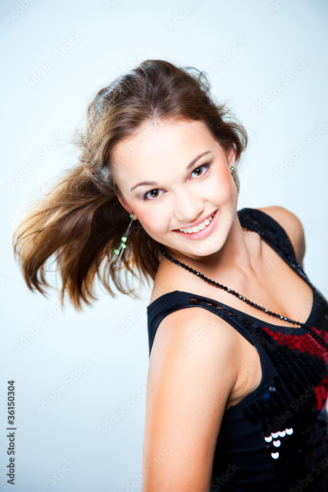 Fototapeta premium Portrait of young beautiful disco dancer girl