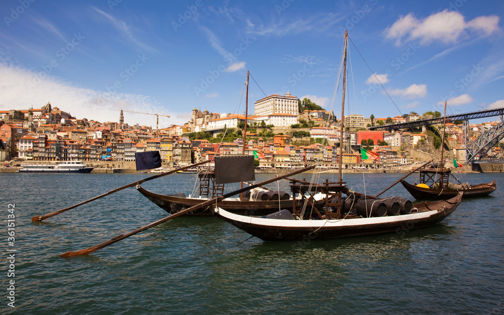 panorama old Porto river Duoro, vintage port transporting boats,