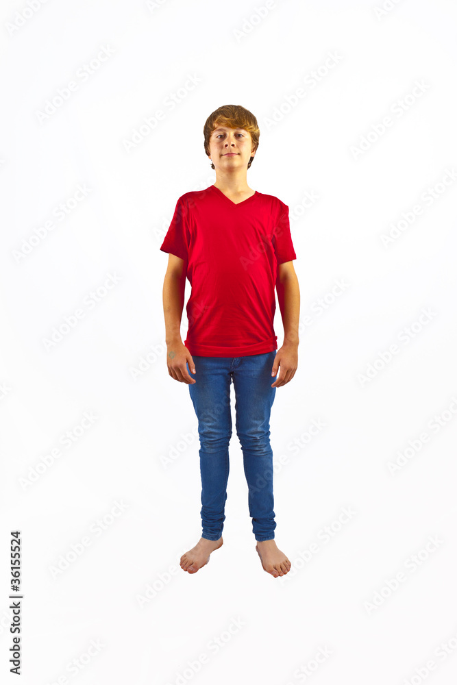 Fototapeta premium smart boy with red shirt jumping in the air