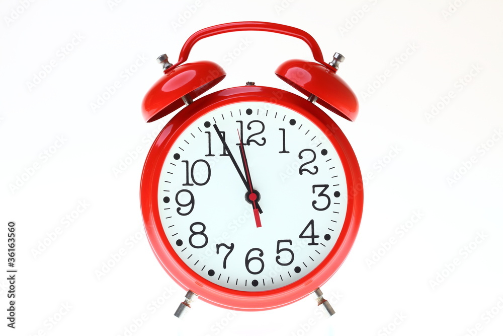 red old style alarm clock isolated red old style alarm clock isolated