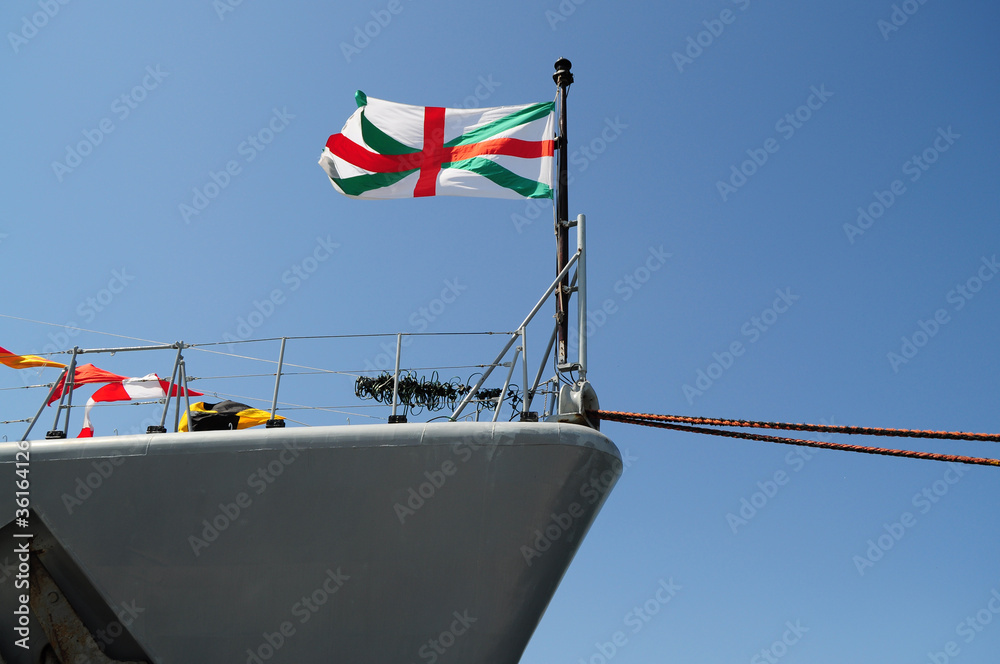 Fototapeta premium Flag waving on a ship