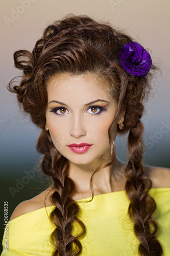 beautiful girl with makeup in a outdoor shooting
