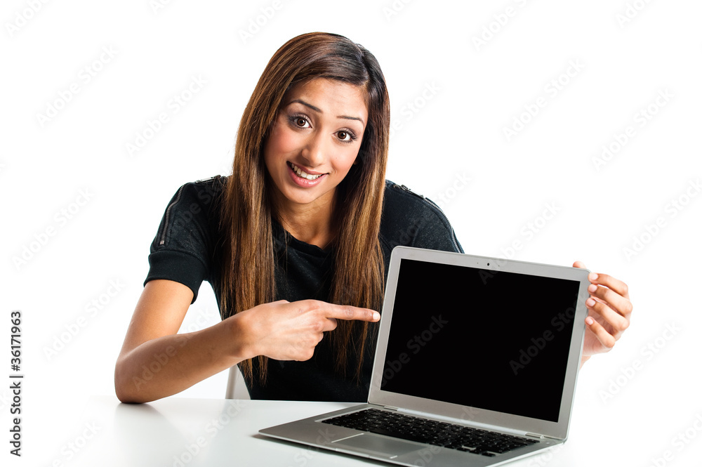Young Asian woman pointing to laptop. Young Asian woman pointing to laptop.