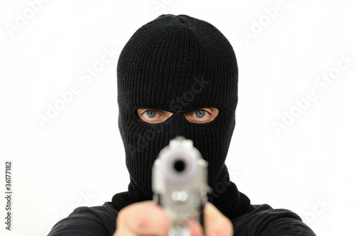 Masked man with gun