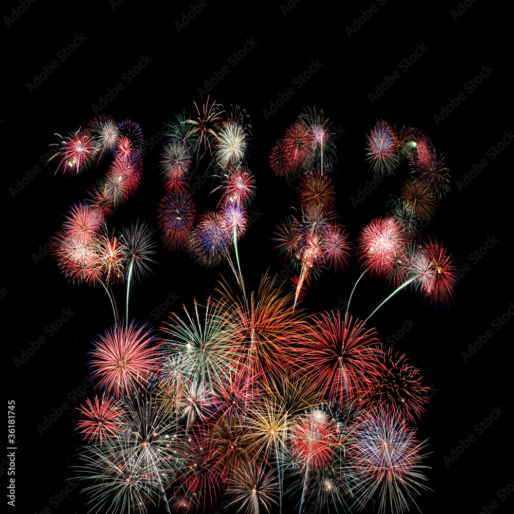 The year 2012 written in fireworks over multiple colorful blasts