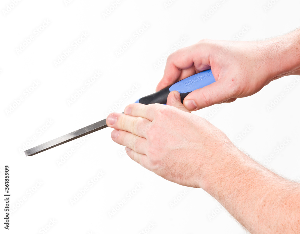 hand with chisel hand with chisel