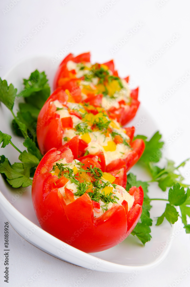 Tomatoes stuffed with russian salad Tomatoes stuffed with russian salad