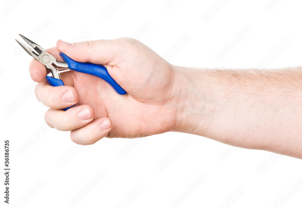 hand with small blue plier hand with small blue plier