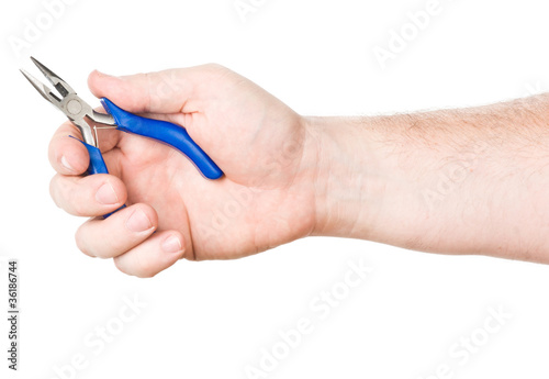 hand with small blue plier