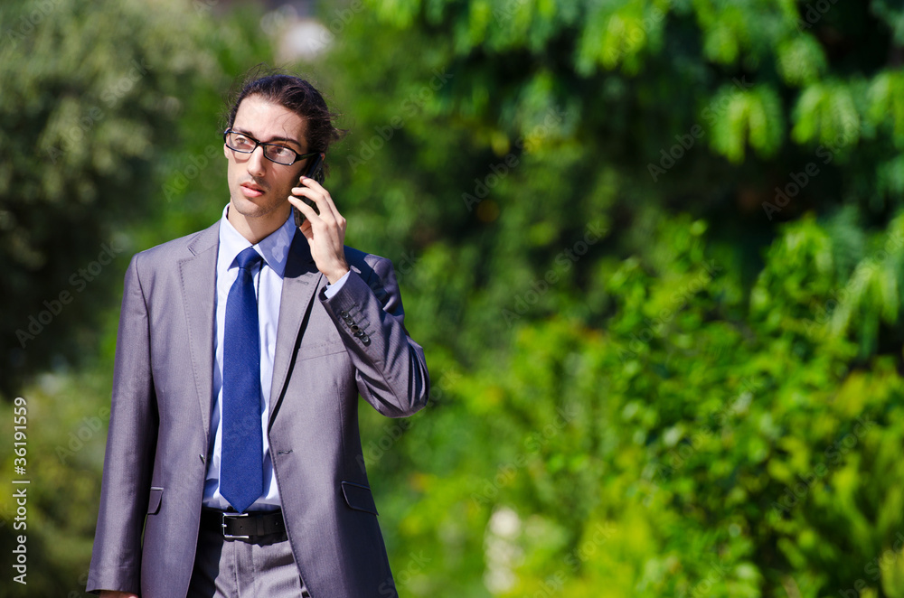 Young businessman at the street scene Young businessman at the street scene