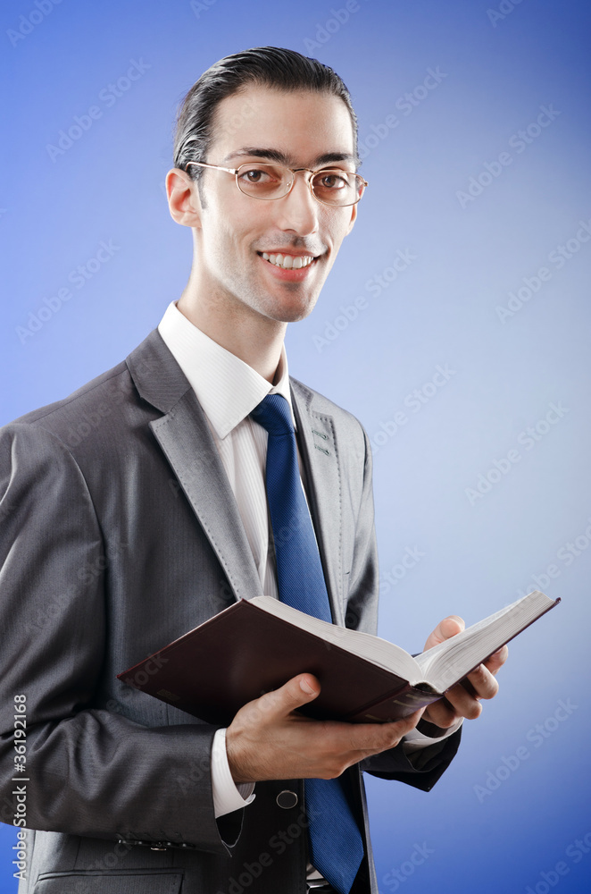 Businessman reading the book