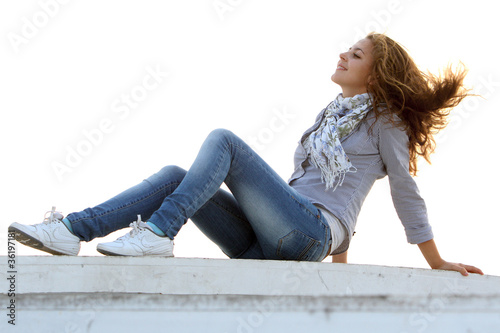 young attractive woman relaxing on white background © Alena Yakusheva
