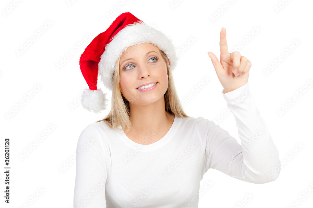 frau mit weihnachtsmütze zeigt mit dem finger frau mit weihnachtsmütze zeigt mit dem finger