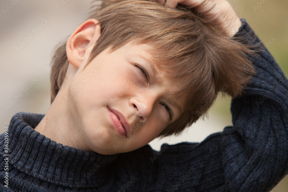 close up portrait of confused kid close up portrait of confused kid
