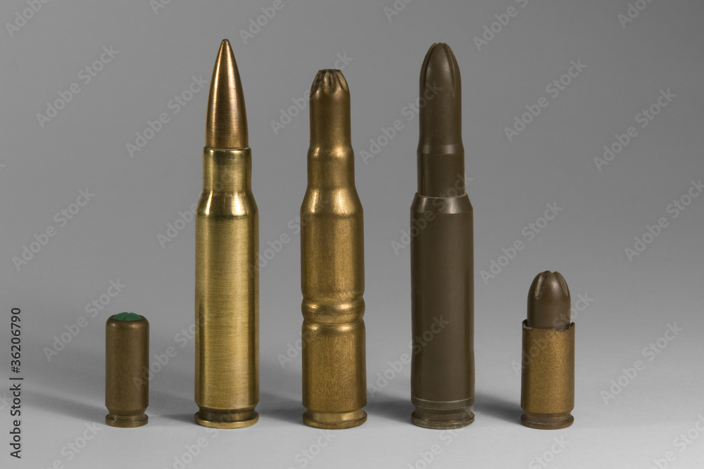 various upright ammunition in grey back various upright ammunition in grey back