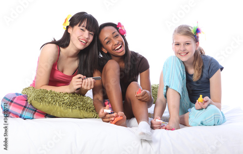 Pyjama party pedicure for ethnic teenage girls