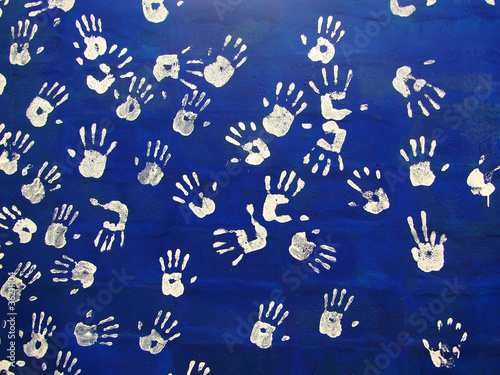 Handprints colors in a mural. Background picture