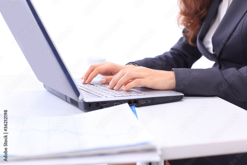 Female hands writing on laptop Female hands writing on laptop
