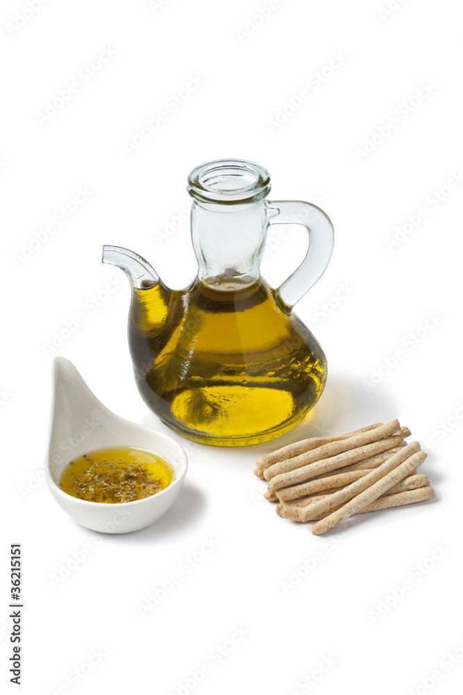 Olive oil with dipper herbs and breadsticks Olive oil with dipper herbs and breadsticks