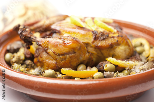 Moroccan dish with chicken and lemon photo