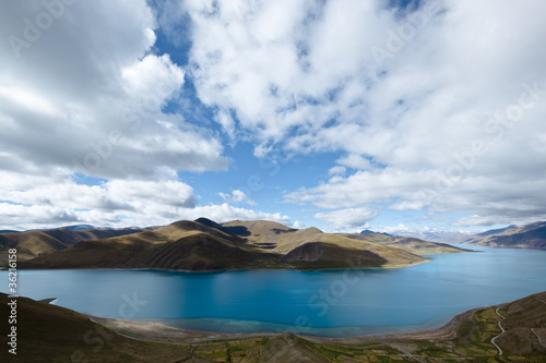 tibet: yamdrok yumtso lake with dramatic sky photo