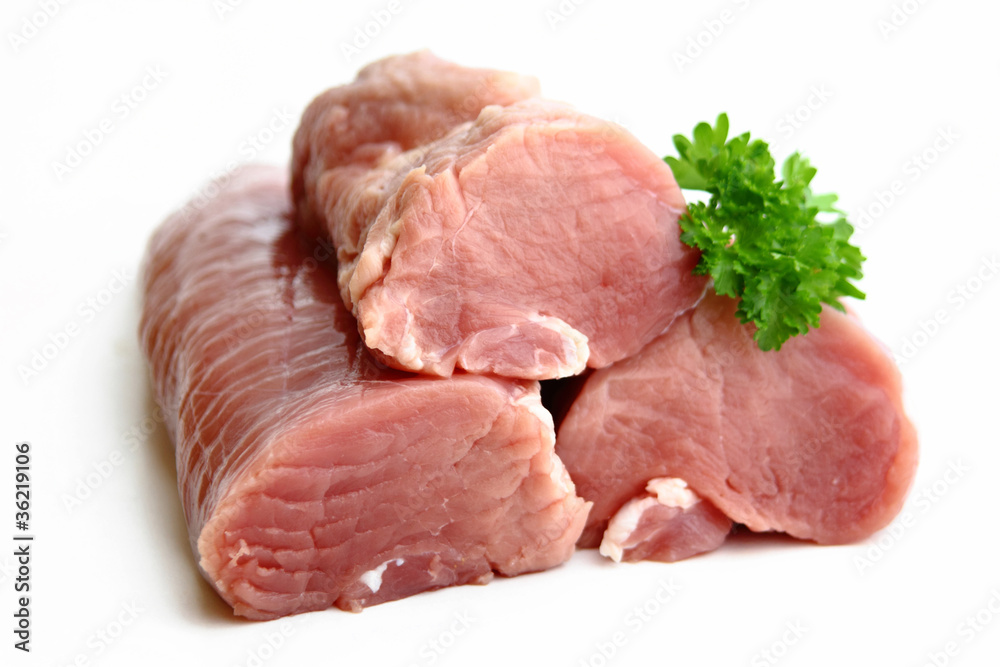 Schweinefilet roh mit Petersilie Schweinefilet roh mit Petersilie