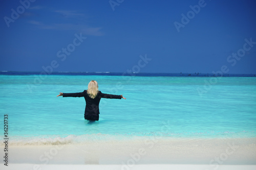 business woman in ocean © yellowj