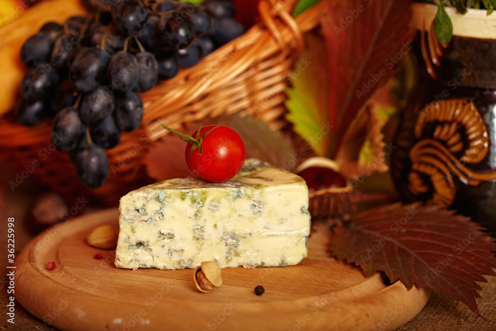 Cheese and autumn fruits