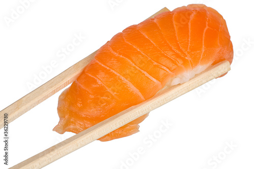 Chopsticks with salmon sushi