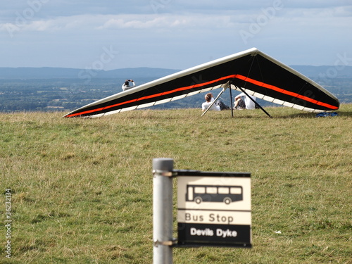 Hang glider at a bus stop on the Devil Dyke mountain
