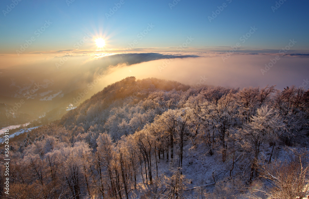 Sunset over clouds in mountain Sunset over clouds in mountain