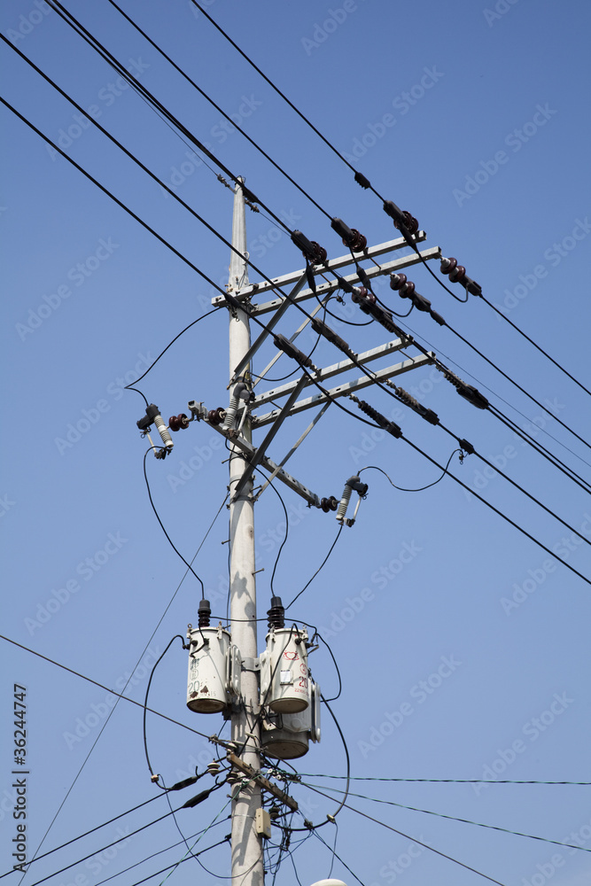 Power line and telephone poll.