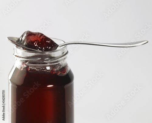 jelly with glass and spoon photo