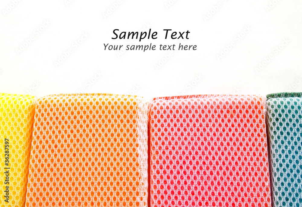 colorful sponges isolated with copy space