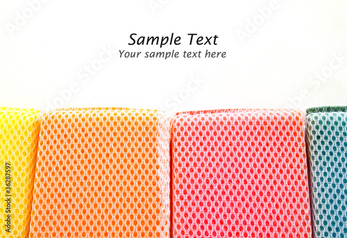 colorful sponges isolated with copy space